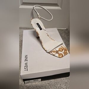 BRAND New Nine West Size 10 white sandals Heel with gold design  in bottom
